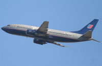 N373UA @ KLAX - United Airlines Shuttle Boeing 737-322, N373UA departing KLAX 25R. - by Mark Kalfas