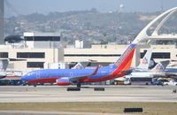 N233LV @ KLAX - Southwest Boeing 737-7H4, N233LV KLAX. - by Mark Kalfas