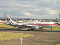 B-6121 @ EGLL - China Eastern just touching down - by Robert Kearney