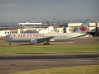 C-GDUZ @ EGLL - Air Canada taxiing to r/w - by Robert Kearney