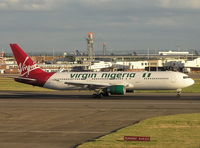 YL-LCZ @ EGLL - Virgin Nigeria rolling to stop - by Robert Kearney