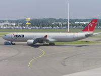 N811NW @ EHAM - NWA on tow - by Robert Kearney