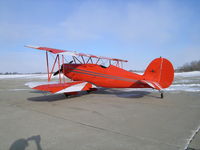 N21XG @ CCY - on the ramp at Charles City, IA on a very cold and windy day in Dec. - by BTBFlyboy