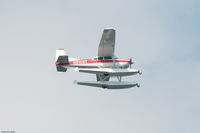 N5108T - Cessna with Pontoons in Flight - by UnSpace