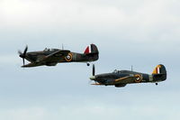 G-HUPW @ EGTH - 45. Pair of Hurricanes at Shuttleworth Military Pagent Air Display  Aug 09 - by Eric.Fishwick
