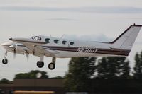 N2700Y @ OSH - Cessna 340, c/n: 340A0793 - by Timothy Aanerud