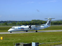 G-ECOI @ EGPH - Flybe Dash8Q-402 taxiing to runway 06 at EDI - by Mike stanners