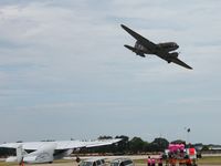 C-GDAK @ OSH - Base to final for 18 at Airventure 2009 - Oshkosh, Wisconsin. - by Bob Simmermon