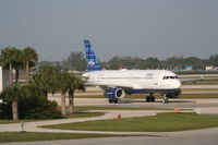 N586JB @ KPBI - JetBlue A320-232, N586JB taxiing off of RWY 13 KPBI to gate.