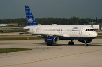 N486JB @ KPBI - JetBlue A320-232, N586JB taxiing off of RWY 13 KPBI to gate.