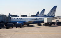 N310UA @ KORD - United Airlines Boeing 737-322, N310UA at B5 KORD preparing for a trip over to KLGA. - by Mark Kalfas