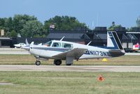 N1173N @ KOSH - Mooney M20J - by Mark Pasqualino