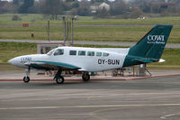 OY-SUN @ EGBJ - Cessna 402C - by Robert Beaver