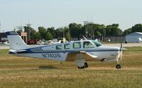 N74US @ KOSH - Beech A36 - by Mark Pasqualino