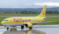D-AGEG @ LOWG - Tuifly B737-300 arriving at the Gate after a strong thunderstorm - by Roland Aigner