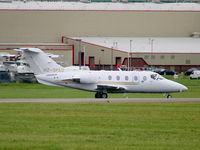 HZ-SPAD @ EGNR - Beechcraft Beechjet 400 - by Chris Hall