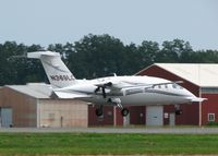 N369LC @ DTN - About to touch down on runway 14.