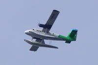 C-FMHR - C-FMHR in flight, heading south, over Vancouver. Taken from Jericho Beach, Vancouver, BC. - by Torben