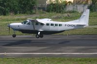 F-OHQN @ TNCM - landing on a wet runway 10 - by daniel jef