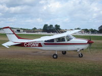 C-FDNW @ KOSH - Cessna T210L - by Mark Pasqualino