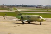 N900FU @ CID - Taxiing back to Rockwell-Collins after landing - by Glenn E. Chatfield