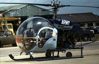 XT242 @ GREENHAM - Sioux AH.1 of the Blue Eagles helicopter display team at the 1974 Intnl Air Tattoo at RAF Greenham Common. - by Peter Nicholson