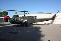 69-15012 @ OSH - uh-1 - by Timothy Aanerud