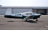 N142W @ KLNC - Mooney M20C on the GA ramp at Warbirds on Parade 2009. - by TorchBCT