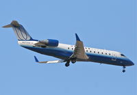 N37208 @ KORD - Mesa Airlines/United Express Bombardier CRJ-200LR, N37208 on final RWY 10 KORD - by Mark Kalfas