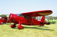 N1227 @ IA27 - At the Antique Airplane Association Fly In.  Was UC-70B 42-49075 - by Glenn E. Chatfield