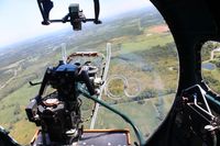 N3193G - View of the Ohio countryside from Yankee Lady's bombardier perch at 2500'. - by Bob Simmermon
