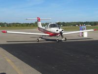 N2450N @ I12 - Pulling up to the pumps at Sidney, Ohio during the EAA fly-in. - by Bob Simmermon