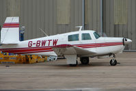 G-BWTW @ EGNX - Mooney M20C at East Midlands - by Terry Fletcher
