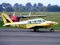 G-BZRO @ EGBJ - Comanche Hire Ltd - by Chris Hall