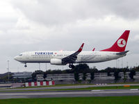 TC-JGN @ EGCC - Boeing 737, c/n  34412, about to land - by John1958