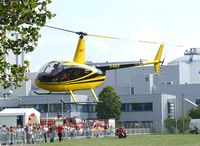 D-HALB @ EDDK - Robinson R44 Raven II of Air Lloyd at the DLR 2009 air and space day on the side of Cologne airport - by Ingo Warnecke