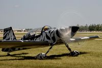 C-FAUH @ KOSH - Taxi for departure - by Todd Royer