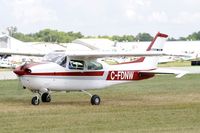 C-FDNW @ KOSH - Taxi to parking - by Todd Royer