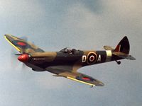 G-BAUP @ EGLK - Doug Arnold's Spitfire LF.XVIe performing at the 1976 Blackbushe Fly-In. - by Peter Nicholson