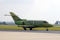N900FU @ CID - Taxiing to Rockwell-Collins - by Glenn E. Chatfield