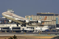 HL7419 @ KLAX - Take off rwy 25R. - by Philippe Bleus