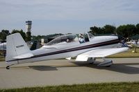 N25MH @ KOSH - Taxi to parking - by Todd Royer