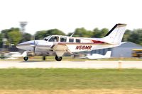 N58MR @ KOSH - Landing 27 at OSH - by Todd Royer