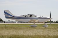 N65SG @ KOSH - Taxi for departure - by Todd Royer