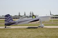 N113UD @ KOSH - Taxi for departure - by Todd Royer