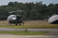 G-MASH @ EGLK - Bell 47 preparing to take off at Blackbushe - by moxy