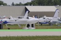 N178EZ @ KOSH - Taxi to parking - by Todd Royer