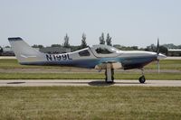 N199L @ KOSH - Taxi for departure - by Todd Royer