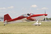 N329JR @ KOSH - Taxi for departure - by Todd Royer