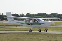 N333J @ KOSH - Taxi for departure